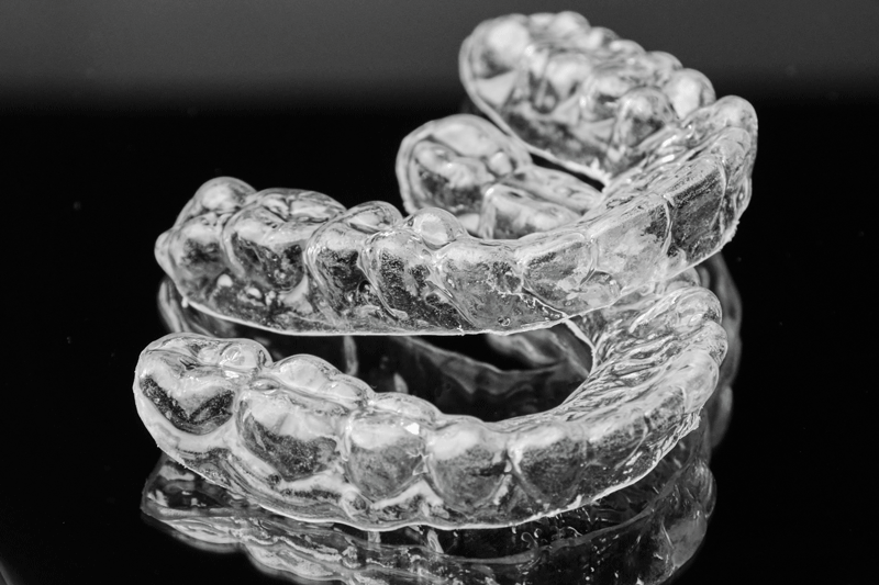 Invisible transparent dental removable braces on the black background